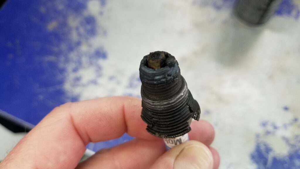 Poorly repaired spark plug threads