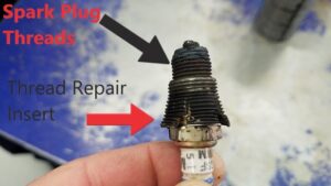 Spark plug thread repair